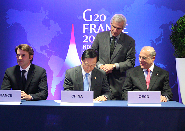 谢旭人出席G20成员国税收征管互助公约签约仪